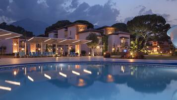 Seasonal outdoor pool, open 9:00 AM to 8:00 PM, free cabanas