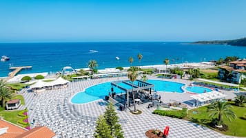 Seasonal outdoor pool, open 9:00 AM to 8:00 PM, free pool cabanas