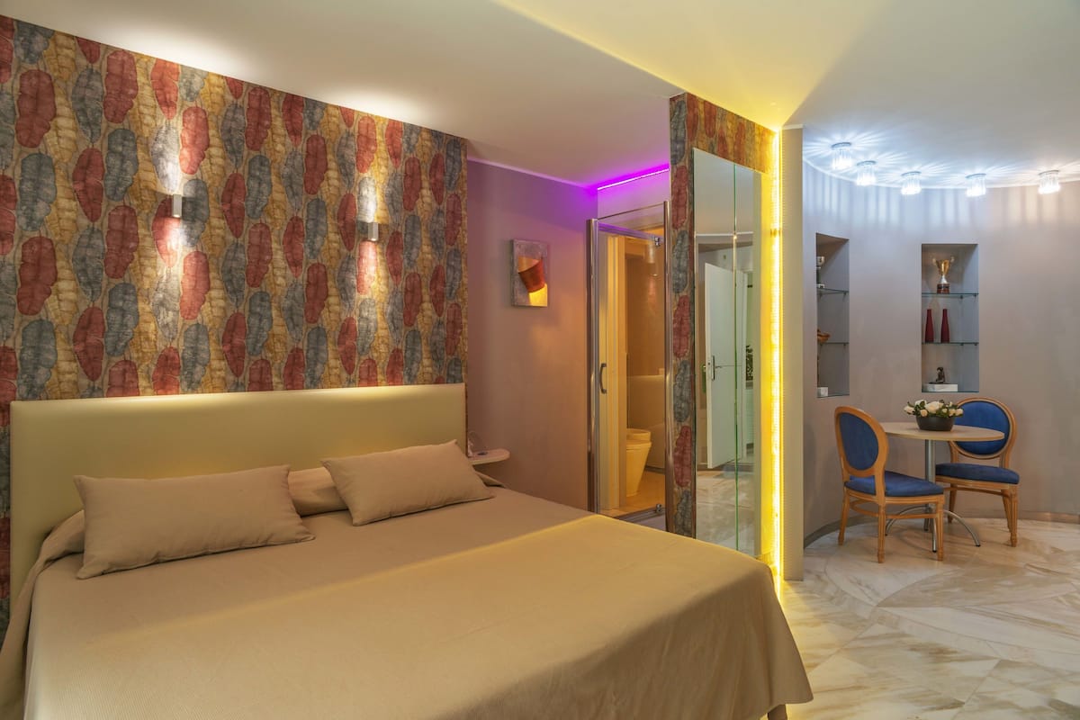 Deluxe Double Room, Patio | Premium bedding, minibar, in-room safe, desk