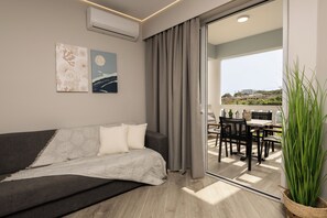 Deluxe Studio, Pool View (2-3 adults) | Living area | Plasma TV