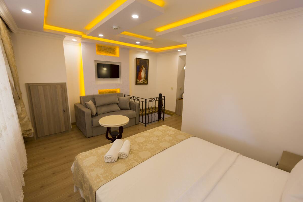 Family Room (Duplex) | Premium bedding, minibar, in-room safe, desk