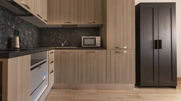 Apartment, 1 Bedroom, Garden View | Private kitchen | Fridge, stovetop, coffee/tea maker, electric kettle