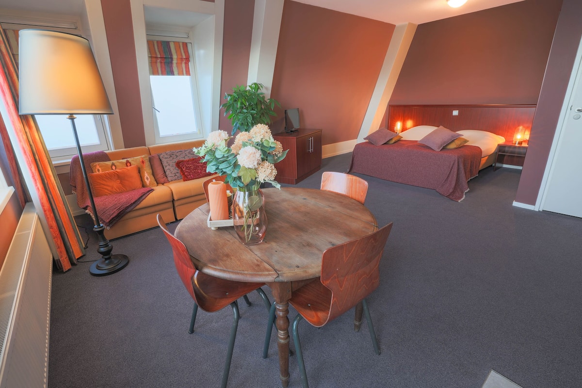 Studio | Een kluis op de kamer, babybedden, gratis wifi, beddengoed