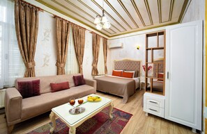 Suite estudio Deluxe, 1 habitación | Ropa de cama de alta calidad y minibar