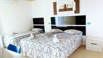 Minibar, bureau, rideaux occultants, lits pliants/supplémentaires