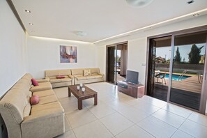 Villa, 3 Bedrooms, Private Pool | Living room | 32-inch LCD TV with satellite channels, TV, DVD player - Satin Villas (Ayia Napa)