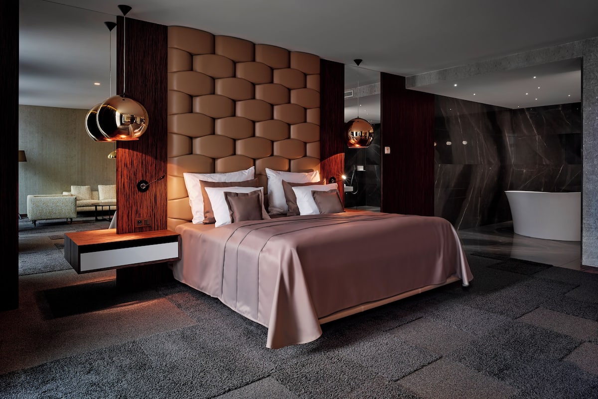 Junior Apartment, 1 Bedroom, Bathtub | 1 bedroom, minibar, in-room safe, desk