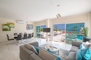 Villa, 4 Bedrooms | Living room | 32-inch flat-screen TV with satellite channels, LCD TV, DVD player - Shaye Frontline Villa (Paralimni)