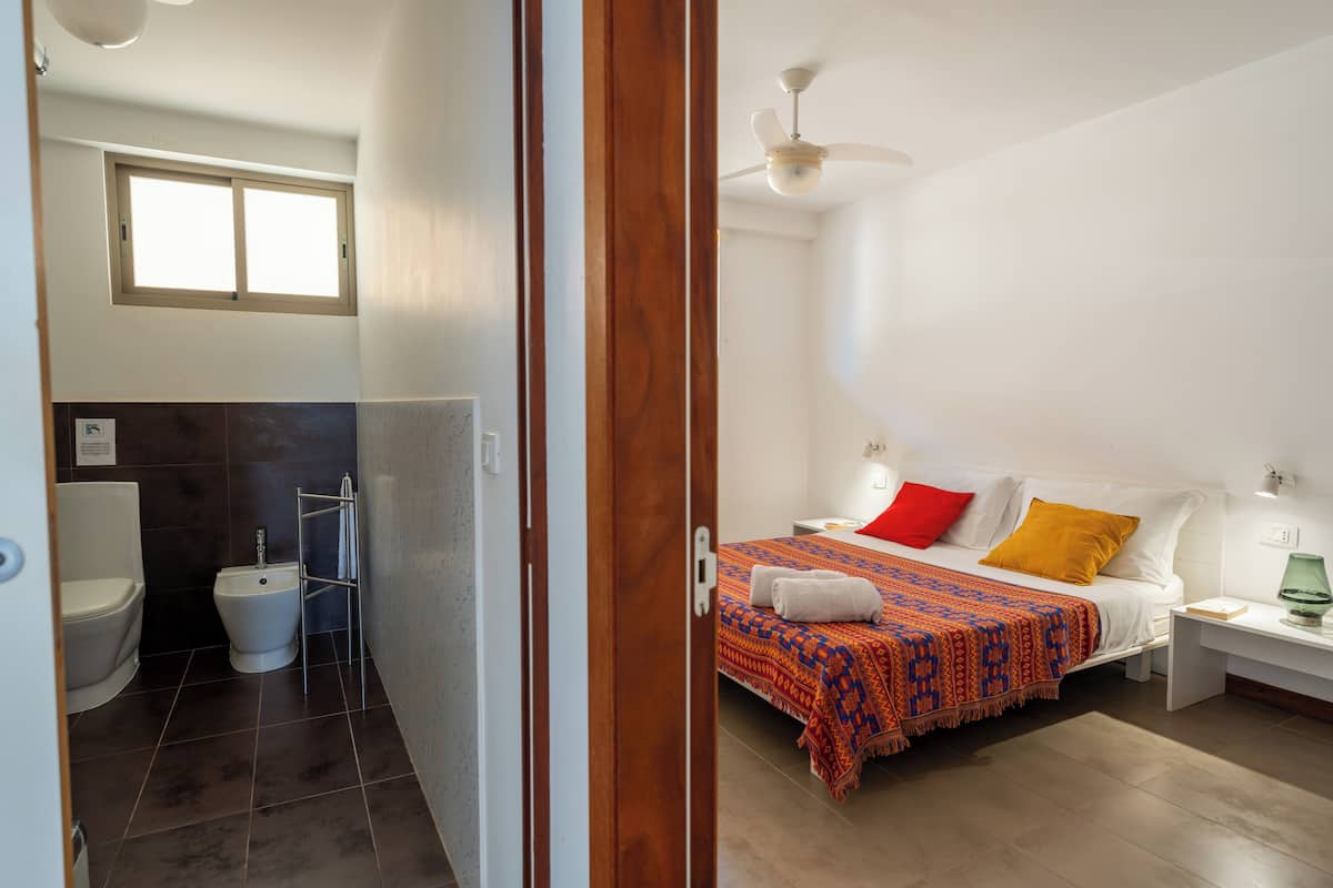 Deluxe Apartment, 1 Bedroom, Kitchenette, Partial Ocean View (Type B) | 2 bedrooms, in-room safe, desk, soundproofing