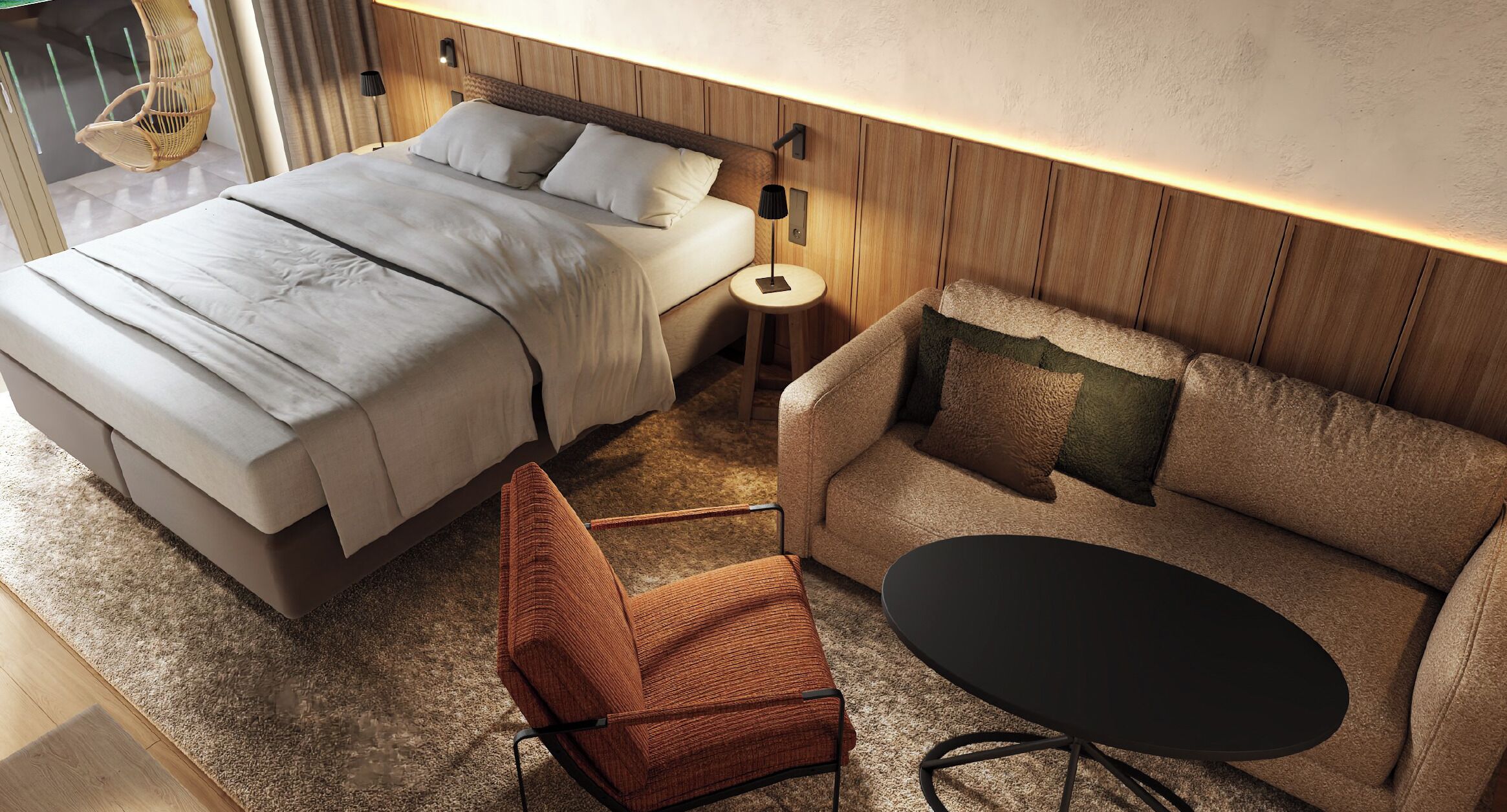 A modern hotel room with a bed, a sofa, a chair, and a small table.