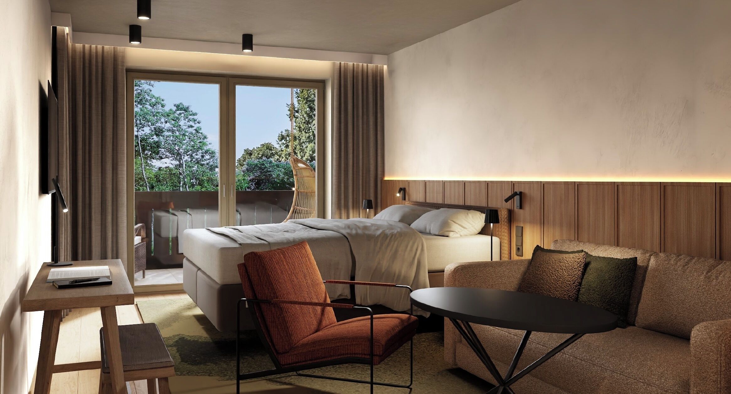 Et moderne hotelværelse med seng, sofa, stol, lille bord og stort vindue.