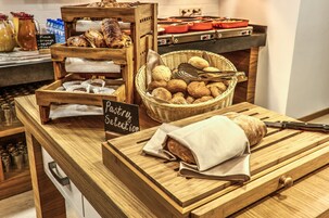 Breakfast, lunch, dinner served; local cuisine 