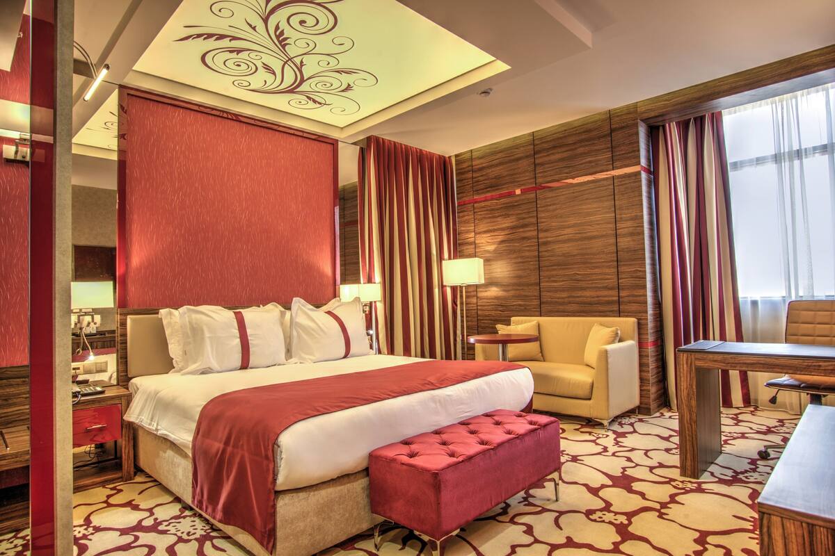 premium room, 1 king bed | 1 bedroom, minibar, in-room safe, desk