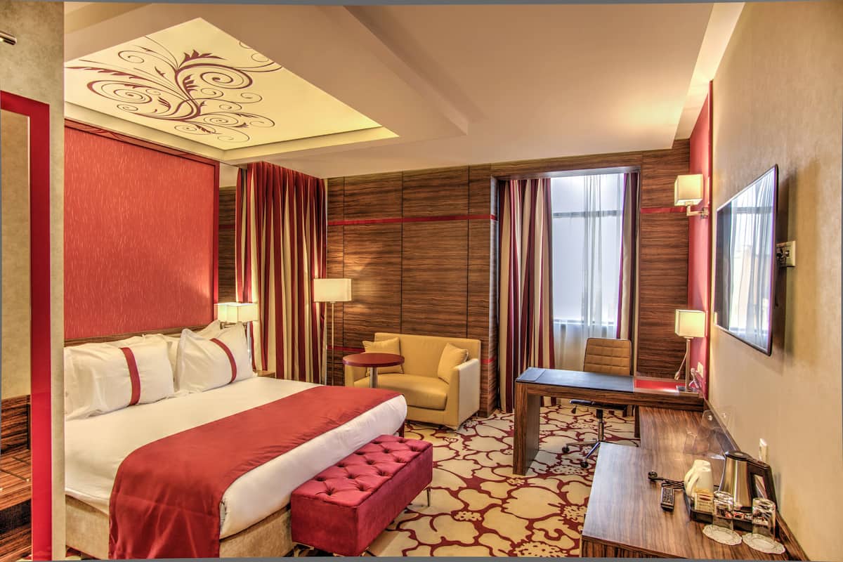 premium room, 1 king bed | 1 bedroom, minibar, in-room safe, desk