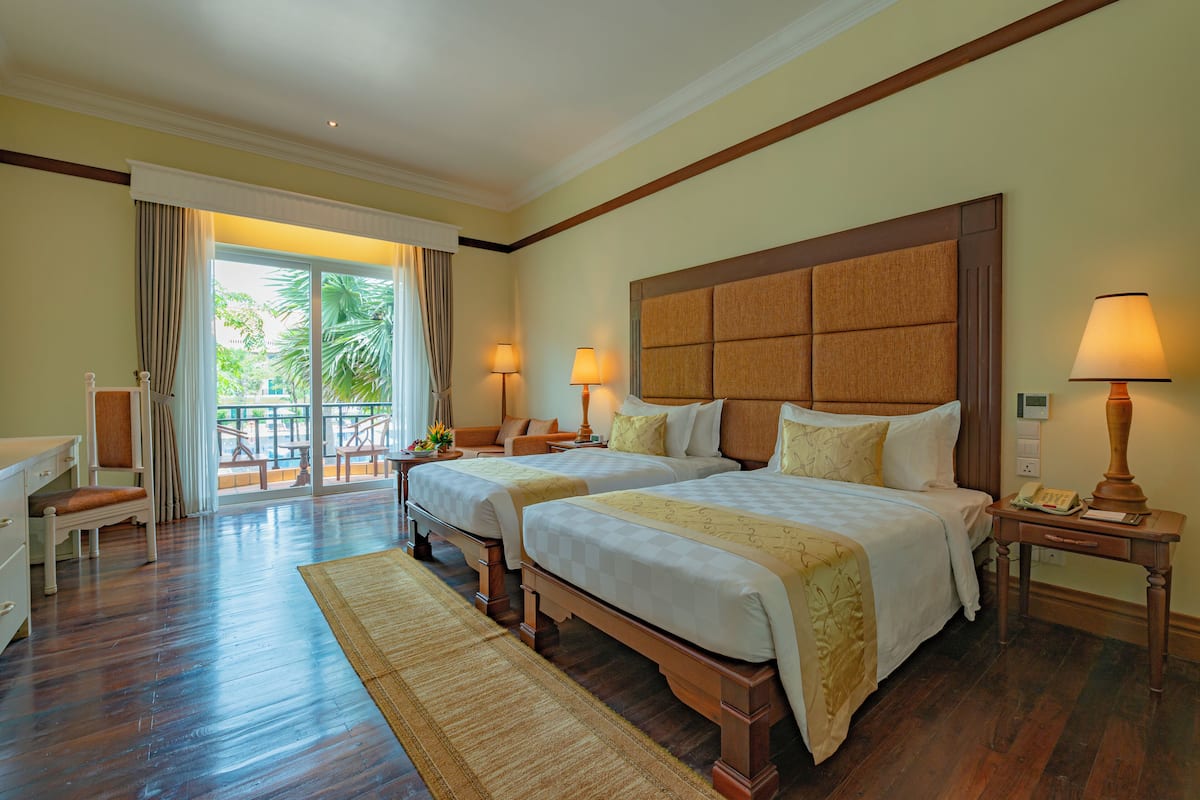 Deluxe Twin Room Pool View | 1 bedroom, premium bedding, in-room safe, desk