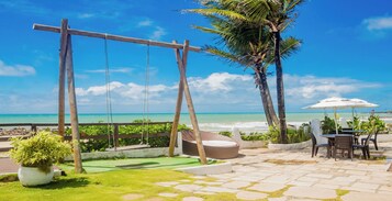 Na praia, toalhas de praia 