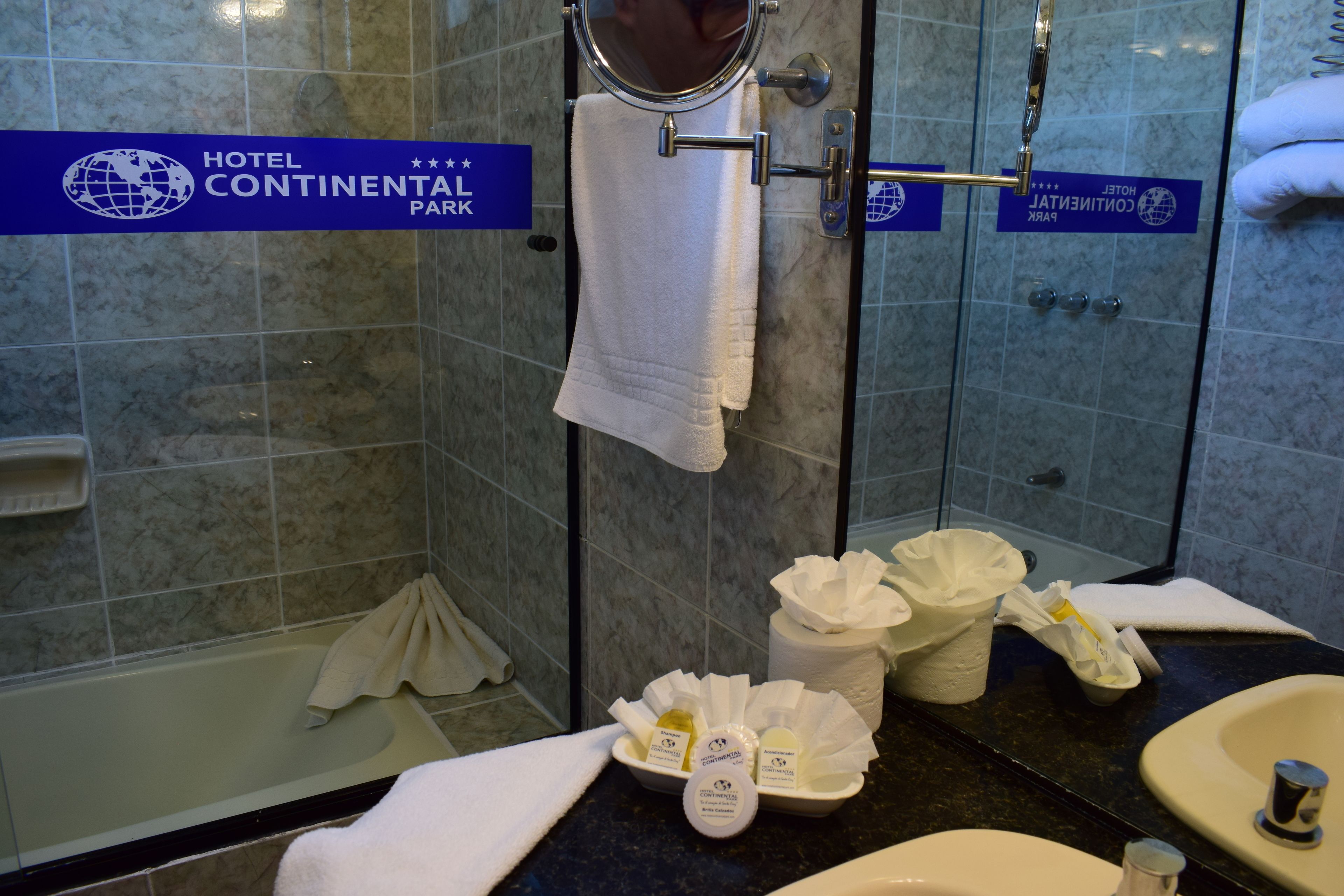 standard double room | bathroom | shower, hair dryer, towels