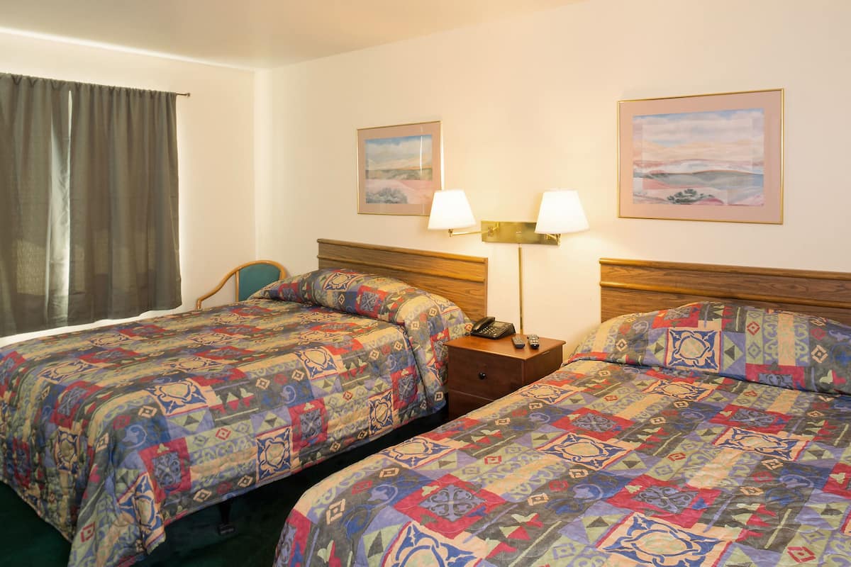 Standard Room, 2 Queen Beds | Individually decorated, desk, iron/ironing board, free WiFi