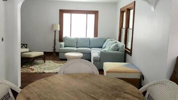 Premier Cottage, 1 Bedroom, Beach View, Beachfront | Living area | 40-inch TV with cable channels