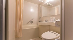 Combined shower/tub, free toiletries, hair dryer, slippers