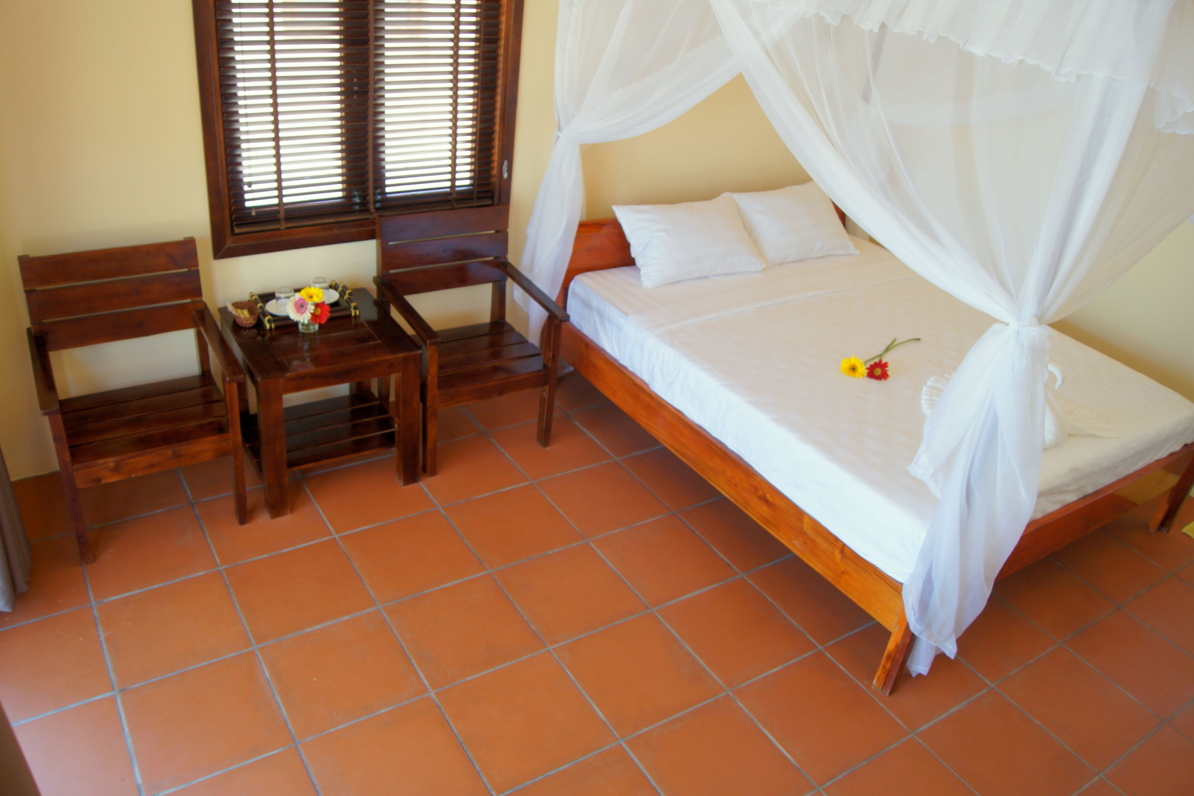 bungalow, beachfront | minibar, in-room safe, desk, rollaway beds