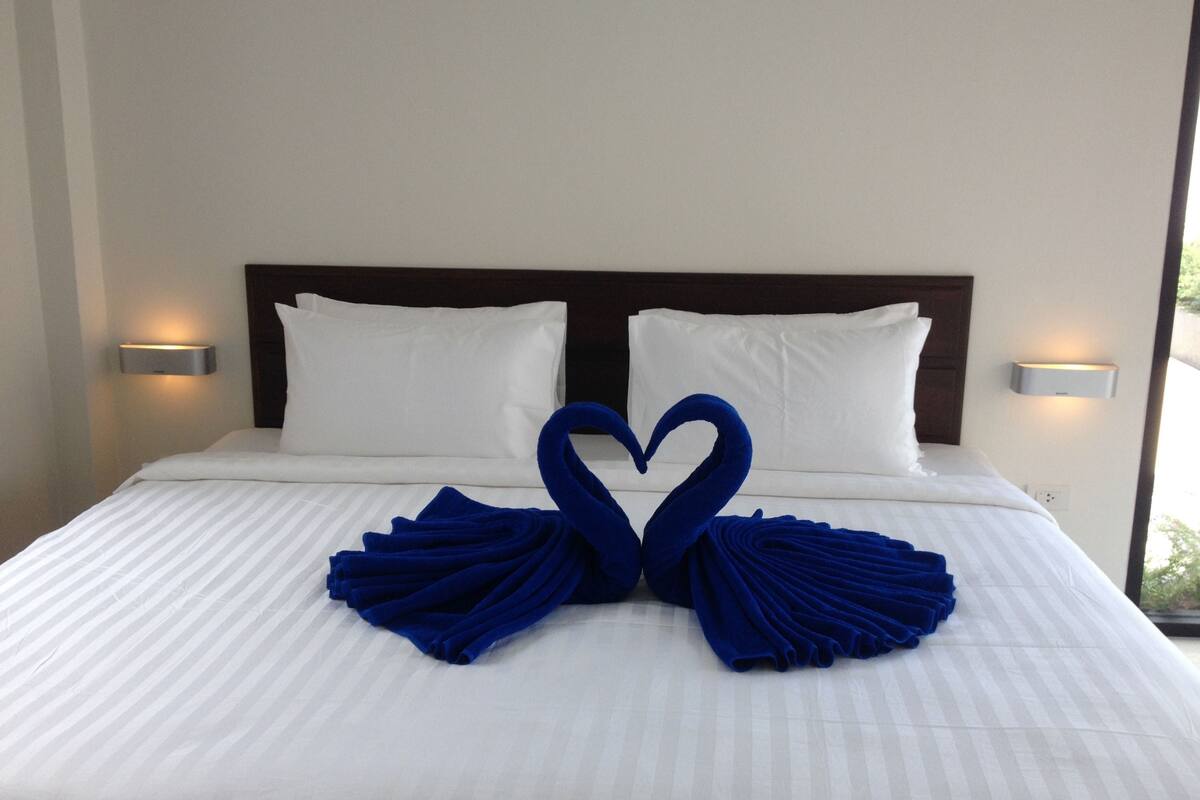 deluxe villa, pool view | minibar, in-room safe, desk, free wifi