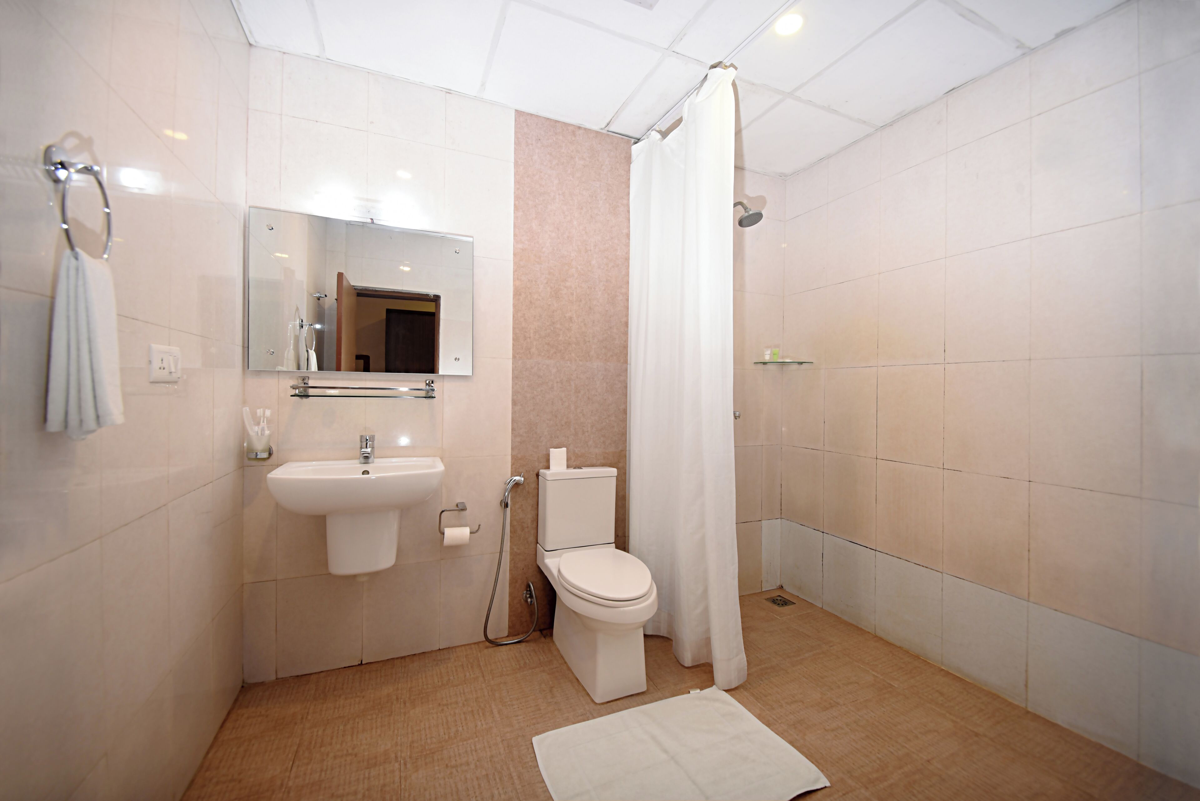 rainfall showerhead, free toiletries, hair dryer, slippers