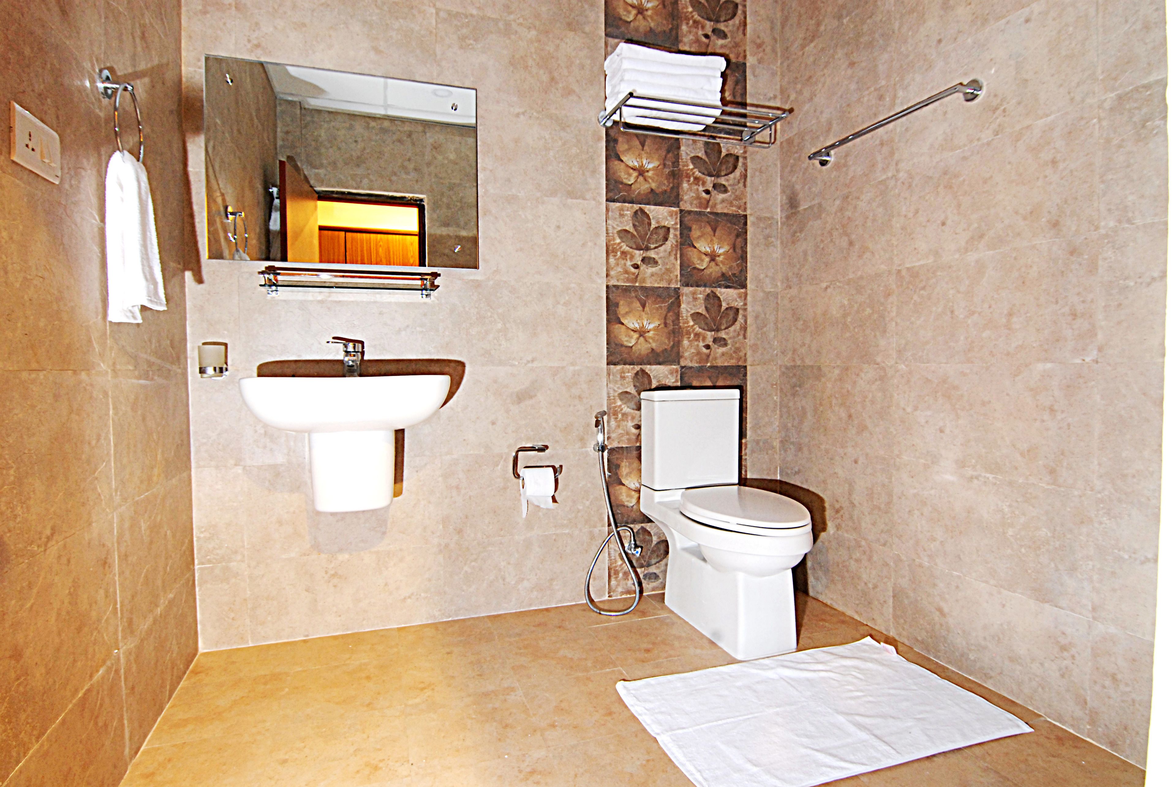 rainfall showerhead, free toiletries, hair dryer, slippers