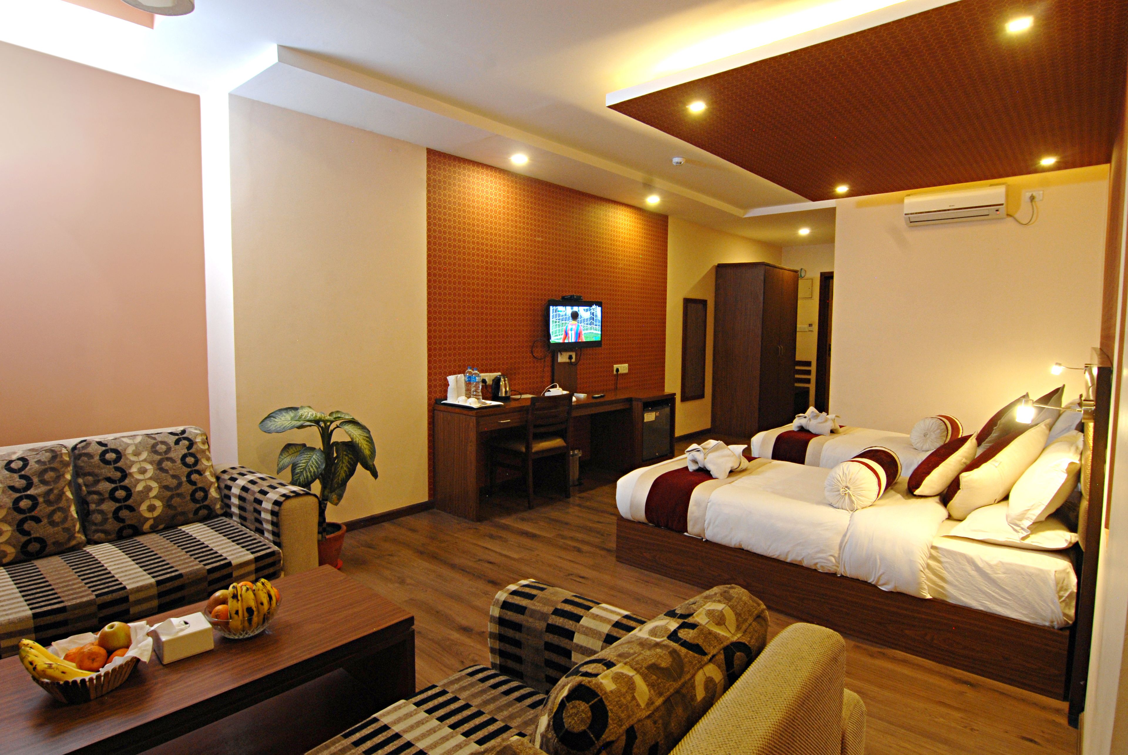 deluxe triple room, 3 single beds, city view | premium bedding, minibar, in-room safe, desk