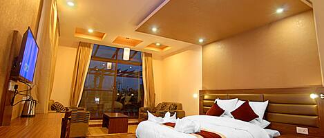 Ropa de cama de alta calidad, minibar, caja fuerte y escritorio