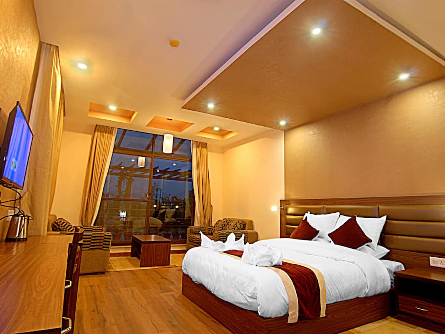 Ropa de cama de alta calidad, minibar, caja fuerte y escritorio