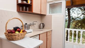 Studio, Sea View (Triple) | Private kitchenette | Fridge, stovetop, coffee/tea maker, electric kettle