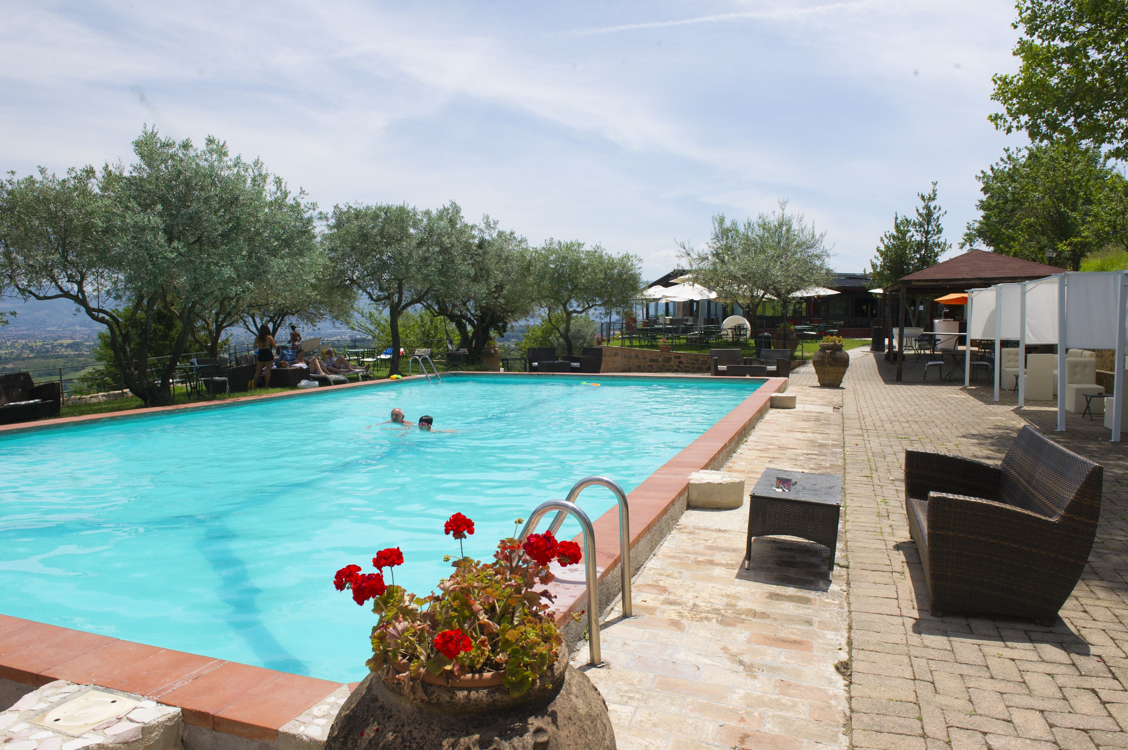 indoor pool, seasonal outdoor pool, open 9 am to 8 pm, pool loungers