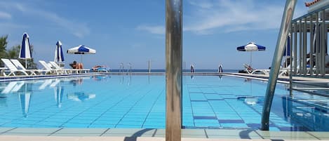 Outdoor pool, sun loungers