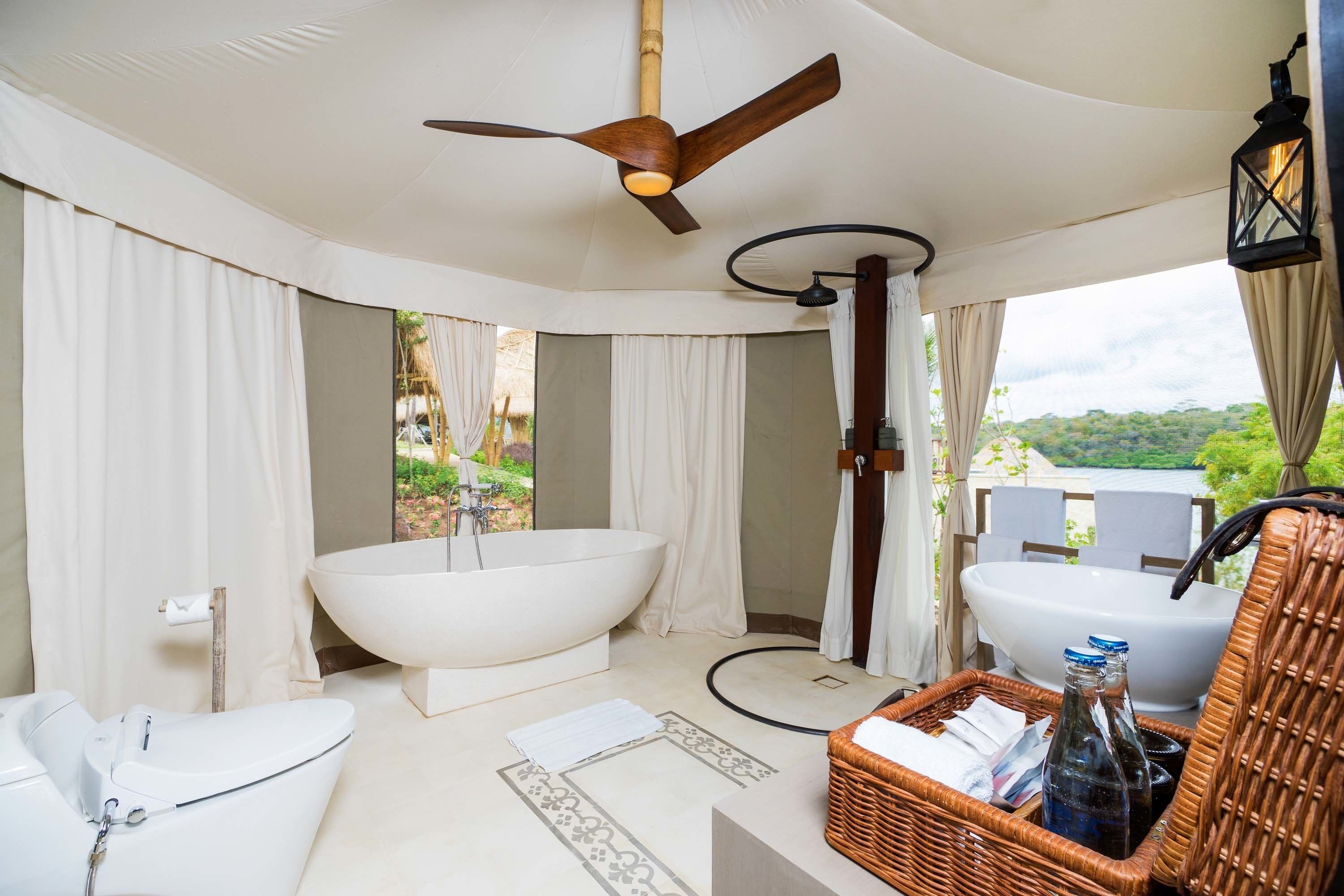 two bedroom cliff tent villa | bathroom | shower, rainfall showerhead, free toiletries, hair dryer