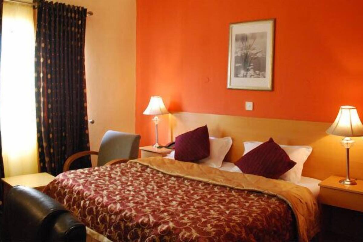 Classic Room | Premium bedding, blackout drapes, WiFi (free)