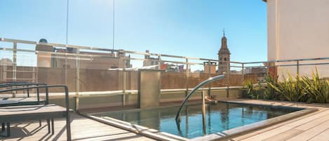 Outdoor pool, open 9:00 AM to 10:00 PM, pool umbrellas, sun loungers