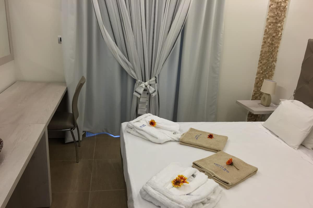 Suite Economy, 1 camera da letto | 1 camera, tende oscuranti, insonorizzazione, Wi-Fi gratuito