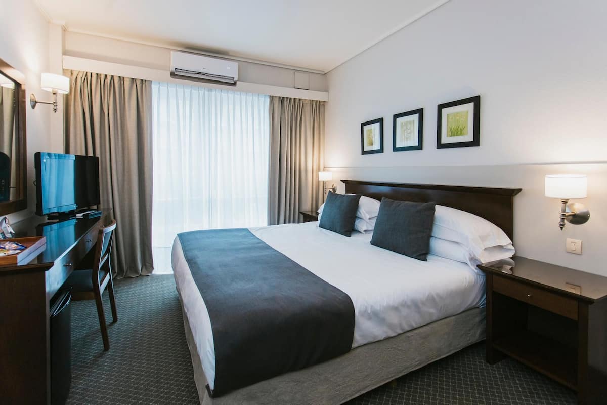 1 habitación, ropa de cama de alta calidad y minibar 