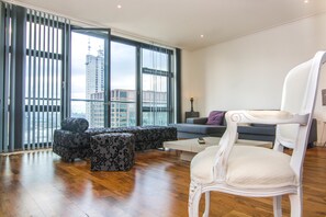 Panoramic Apartment, 2 Bedrooms, River View | Living area | 40-inch flat-screen TV with digital channels, TV - Canary Wharf - Corporate River View Apartments (London)