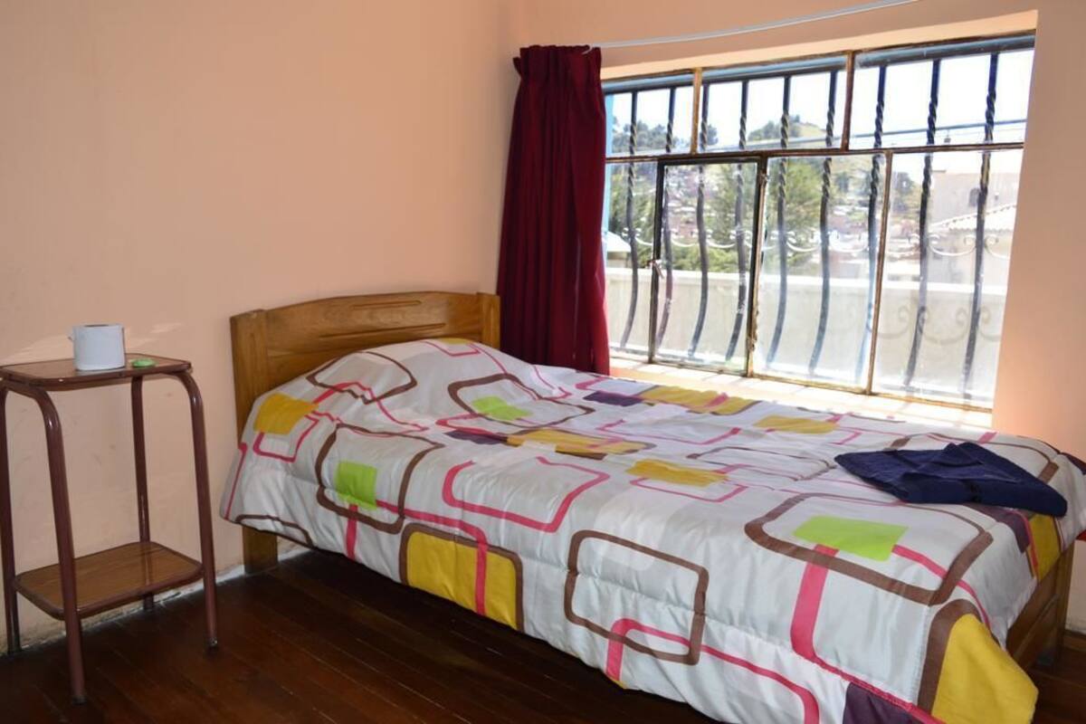 Single Room, Shared Bathroom