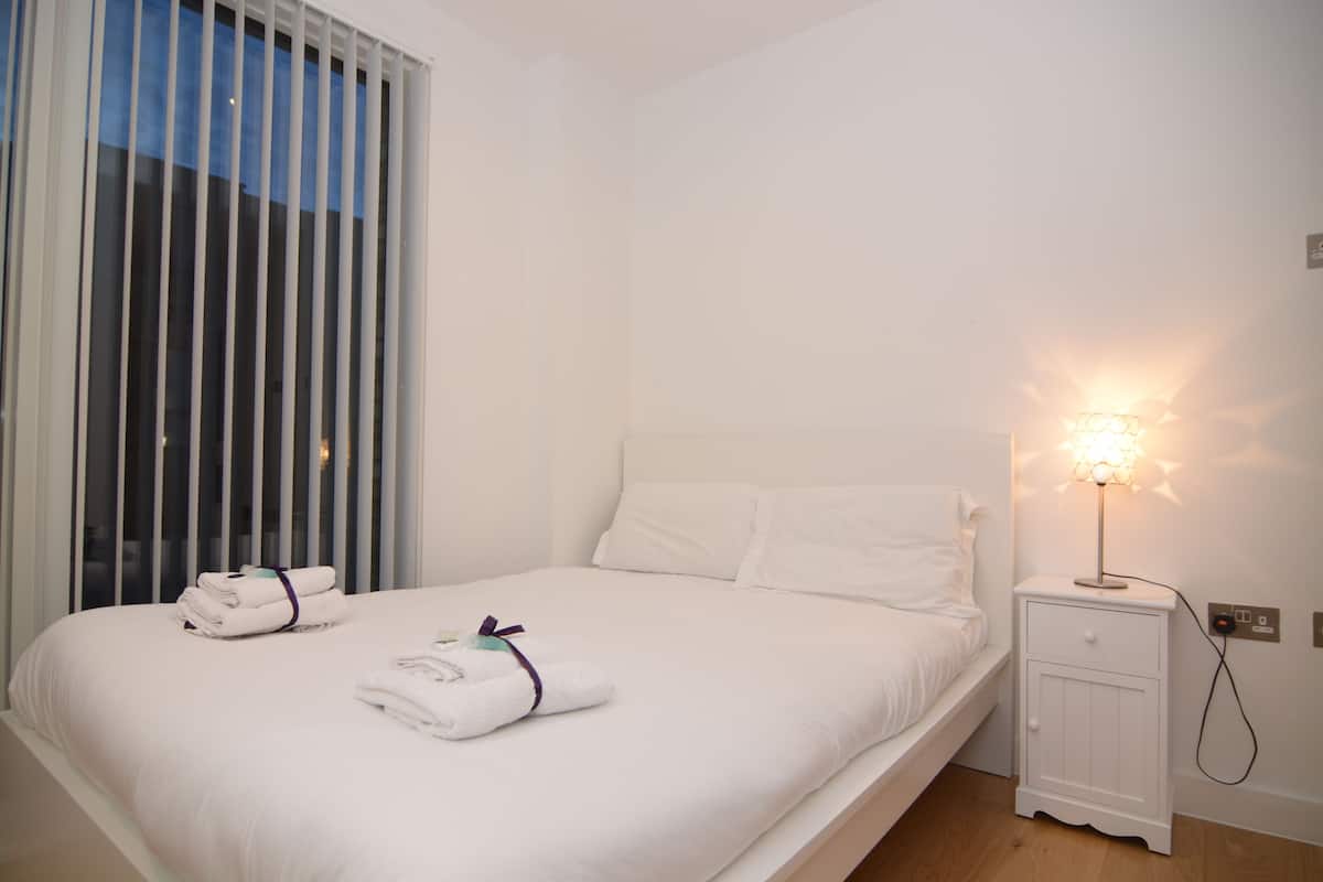 Appartement, 4 chambres | 1 chambre, draps en coton égyptien, fer et planche à repasser