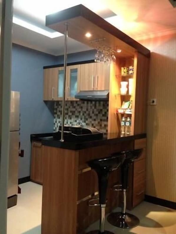 Apartemen, 2 kamar tidur | Dapur kecil pribadi | Lemari es besar, kompor, dan peralatan masak/sendok-piring
