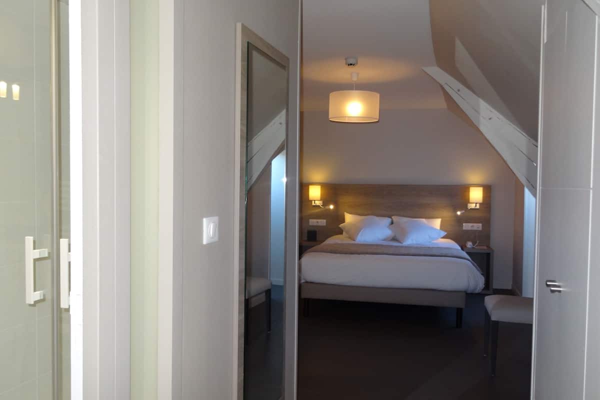 family room | premium bedding, desk, iron/ironing board, free wifi