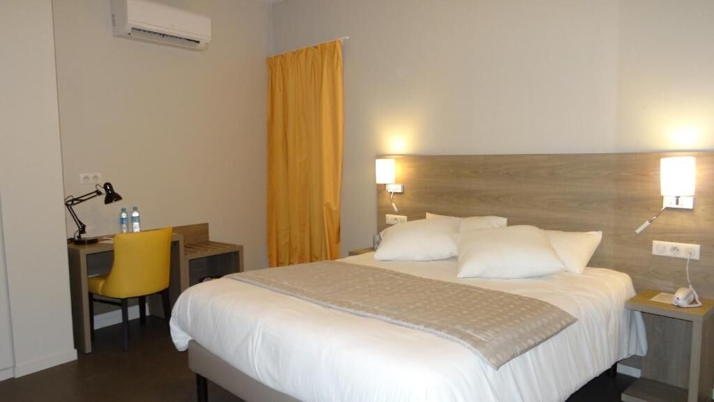 premium bedding, desk, iron/ironing board, free wifi