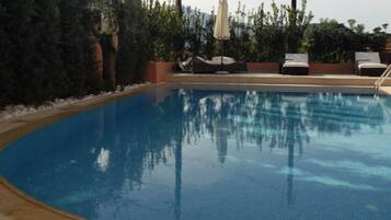 Outdoor pool, sun loungers