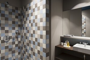 Ducha, artículos de higiene personal gratuitos y secador de pelo