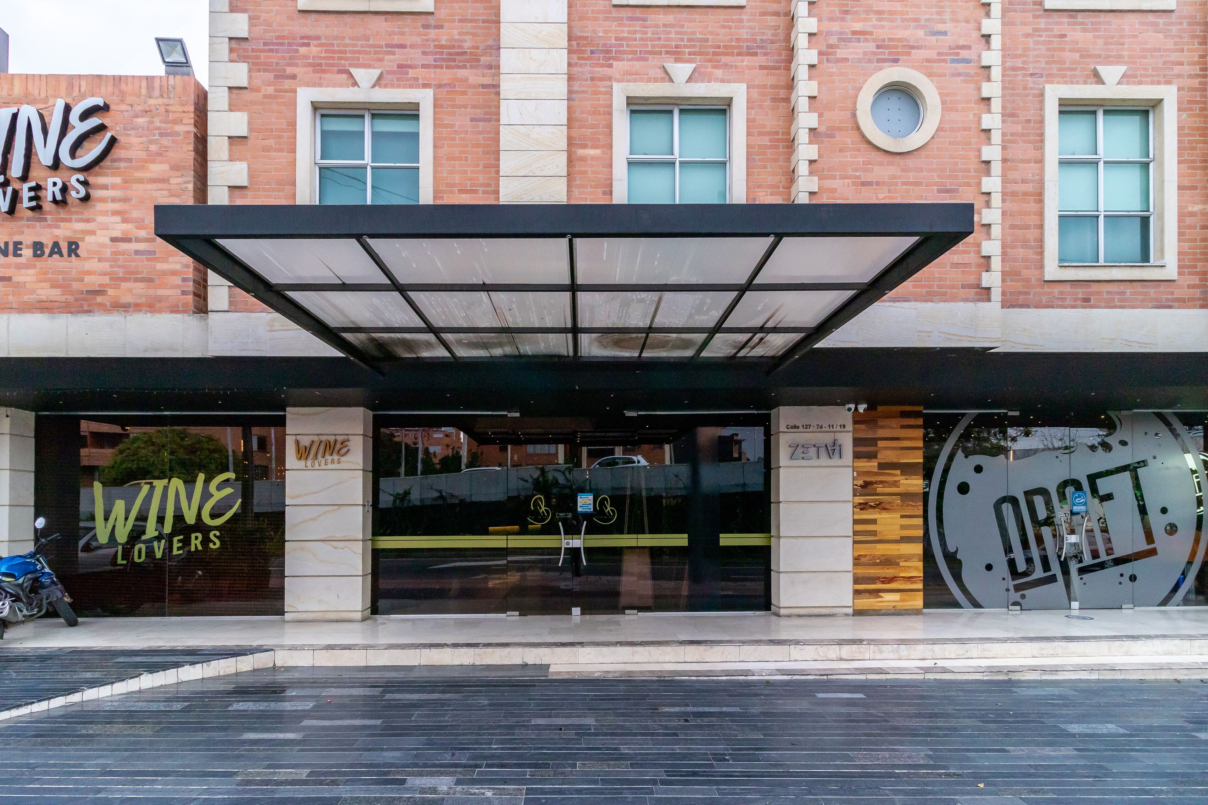 A building with a wine bar and a restaurant named 'Wine Lovers'.