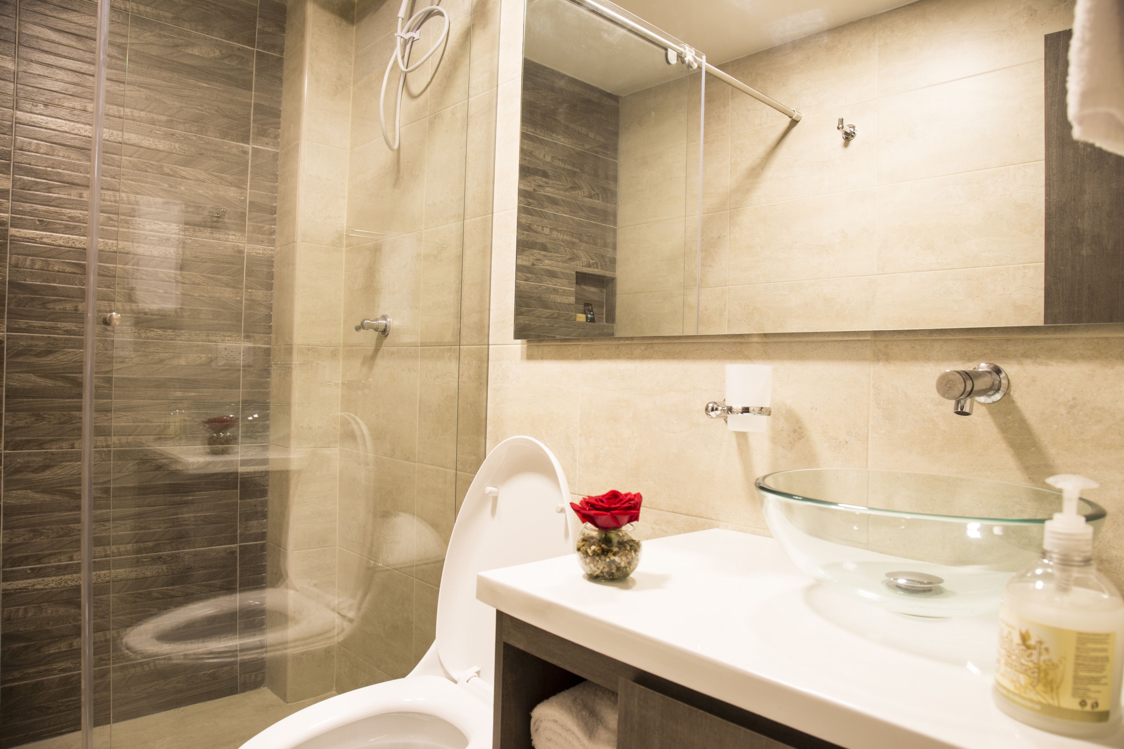 shower, free toiletries, towels, soap