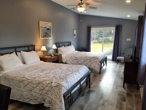 Quarto quádruplo superior, suíte, vista parcial para o mar (Windemere)